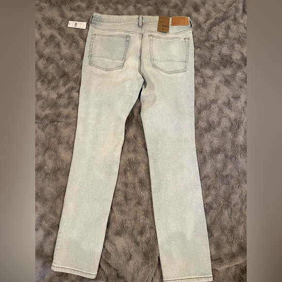 PacSun Men’s Eco Light Wash Painted Stacked Skinny Comfort Stretch Jeans - Picture 7 of 10